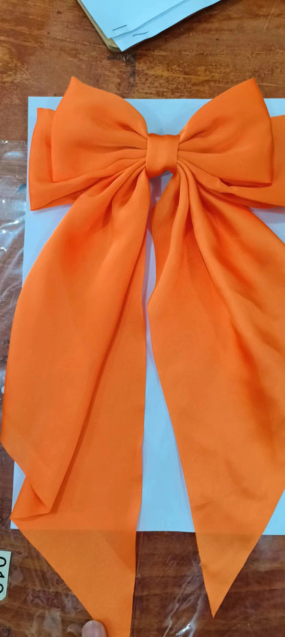 Large elegant bow, long flowing ribbon, simple but effective spring clip hairpin