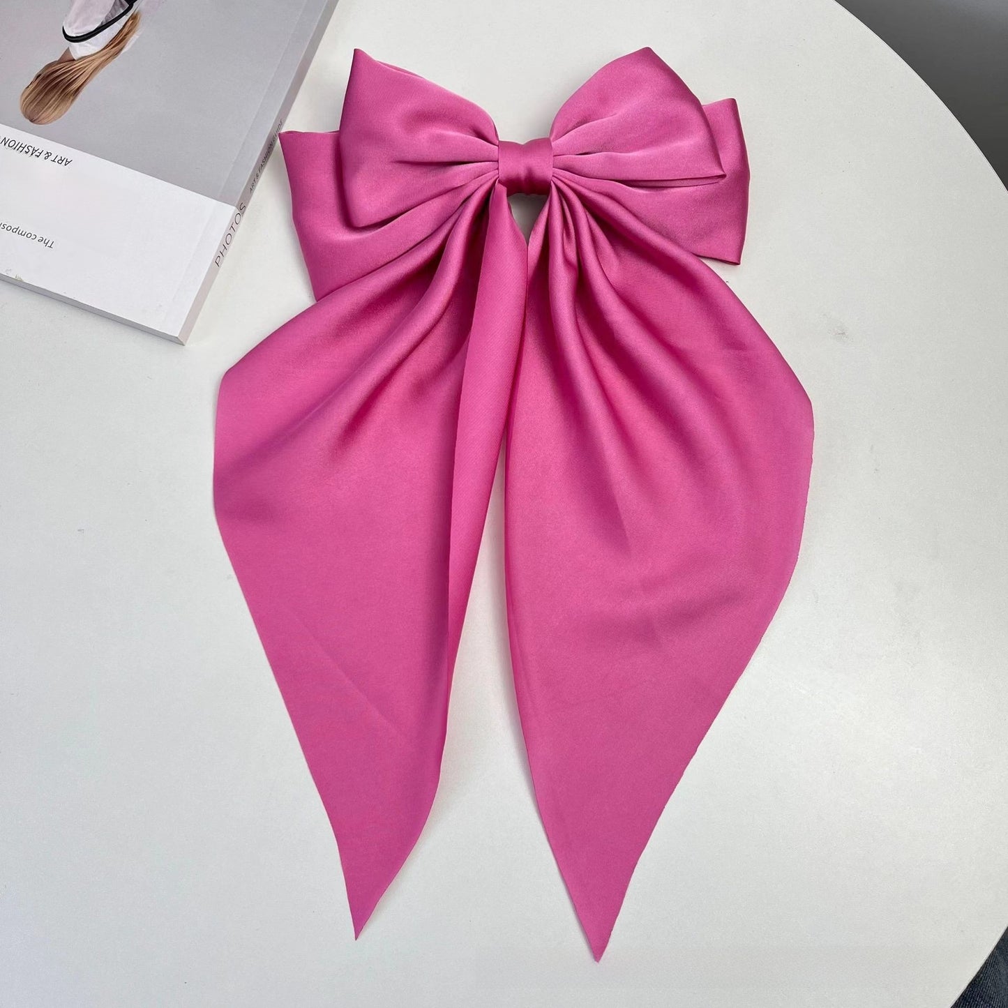 Large elegant bow, long flowing ribbon, simple but effective spring clip hairpin